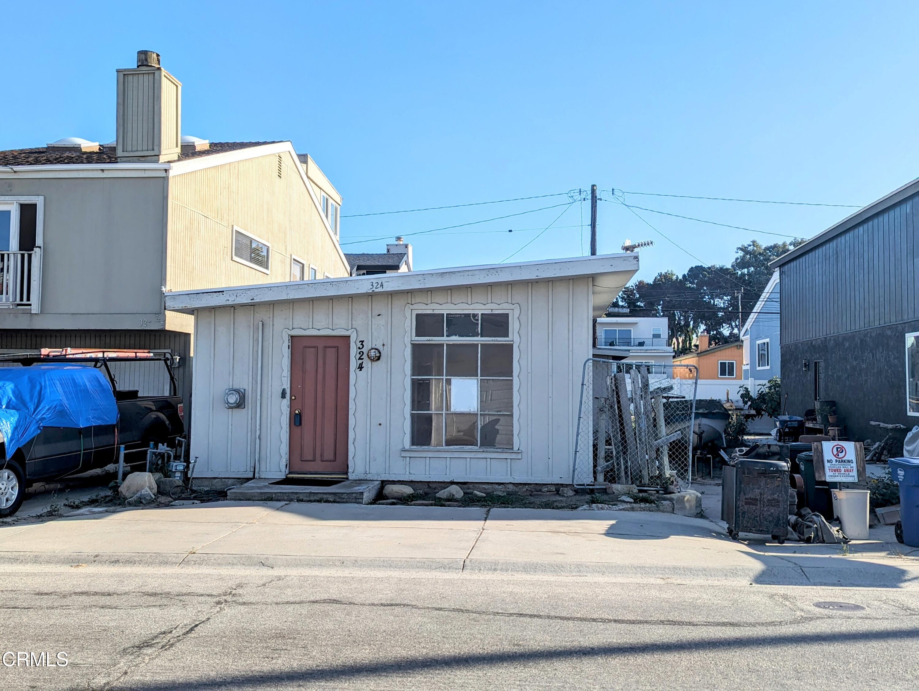 324 Cahuenga Drive Oxnard, CA 93035 - Photo 6 of 17 a front view of a house with garage