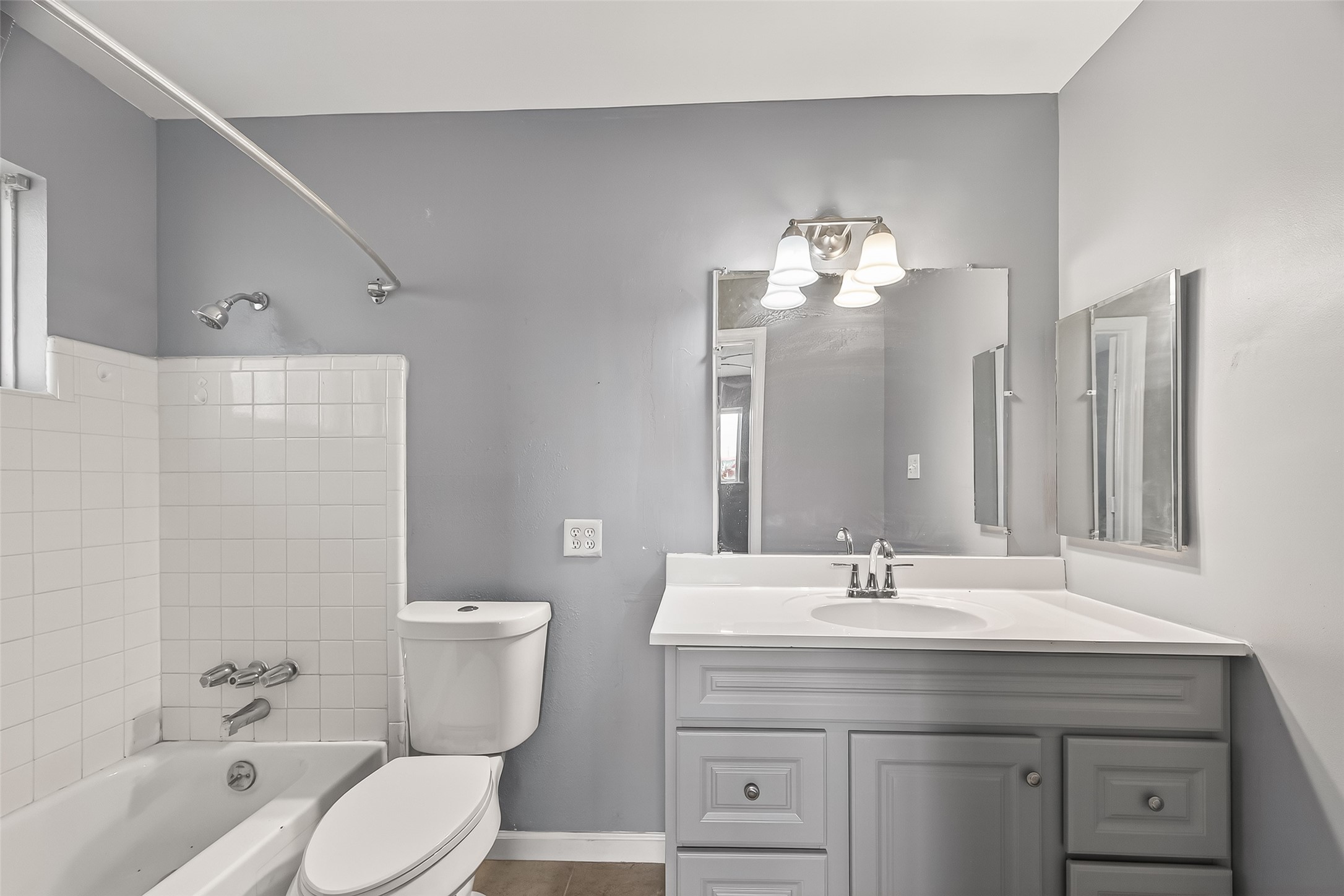 11927 Flushing Meadows Drive Houston, TX 77089 - Photo 18 of 36 a bathroom with a sink vanity mirror and toilet