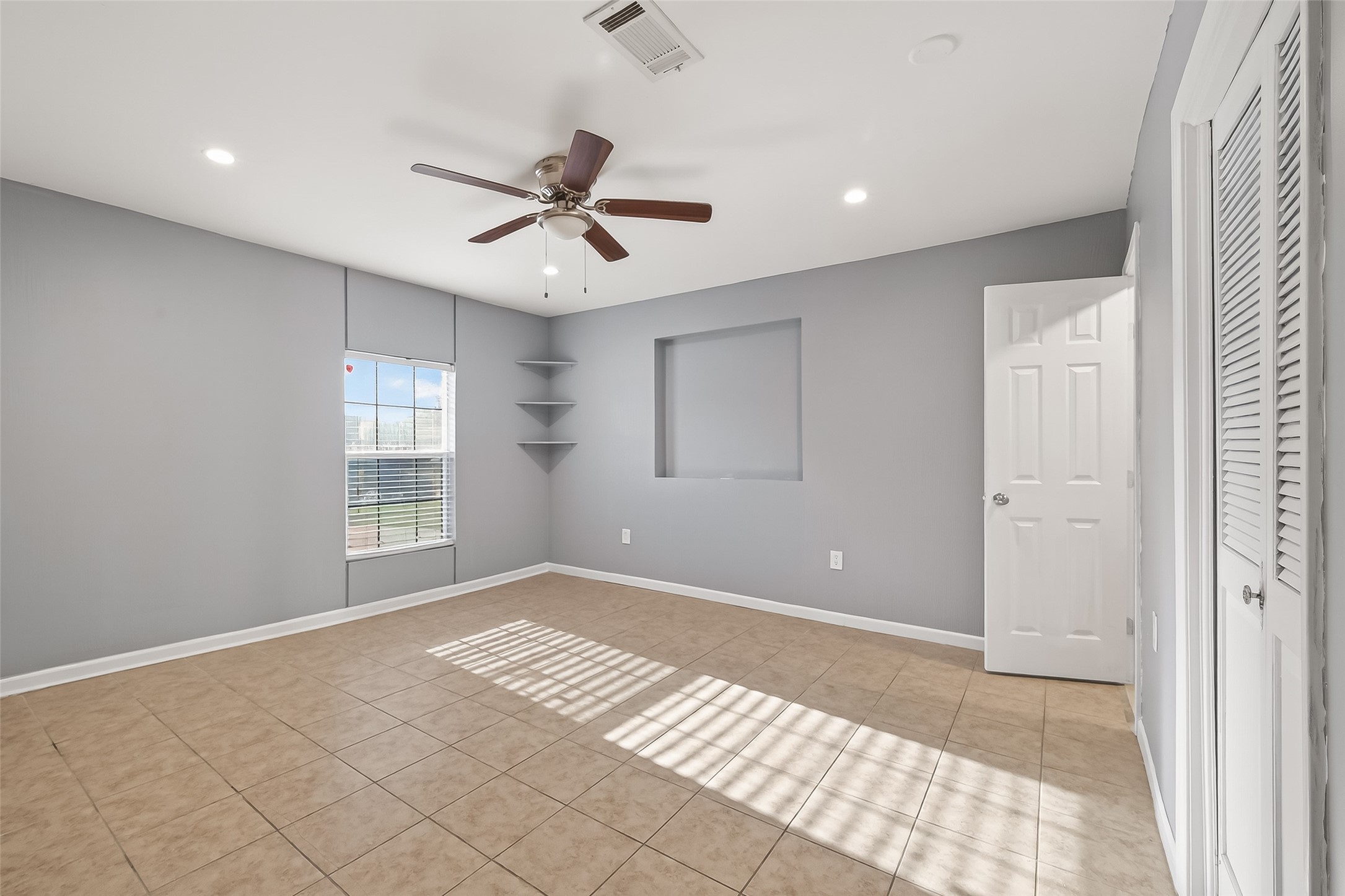 11927 Flushing Meadows Drive Houston, TX 77089 - Photo 26 of 36 a view of an empty room with a window
