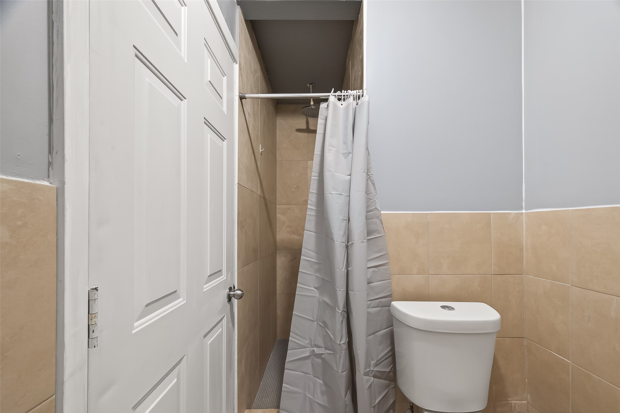 11927 Flushing Meadows Drive Houston, TX 77089 - Photo 30 of 36 a bathroom with a toilet and a shower