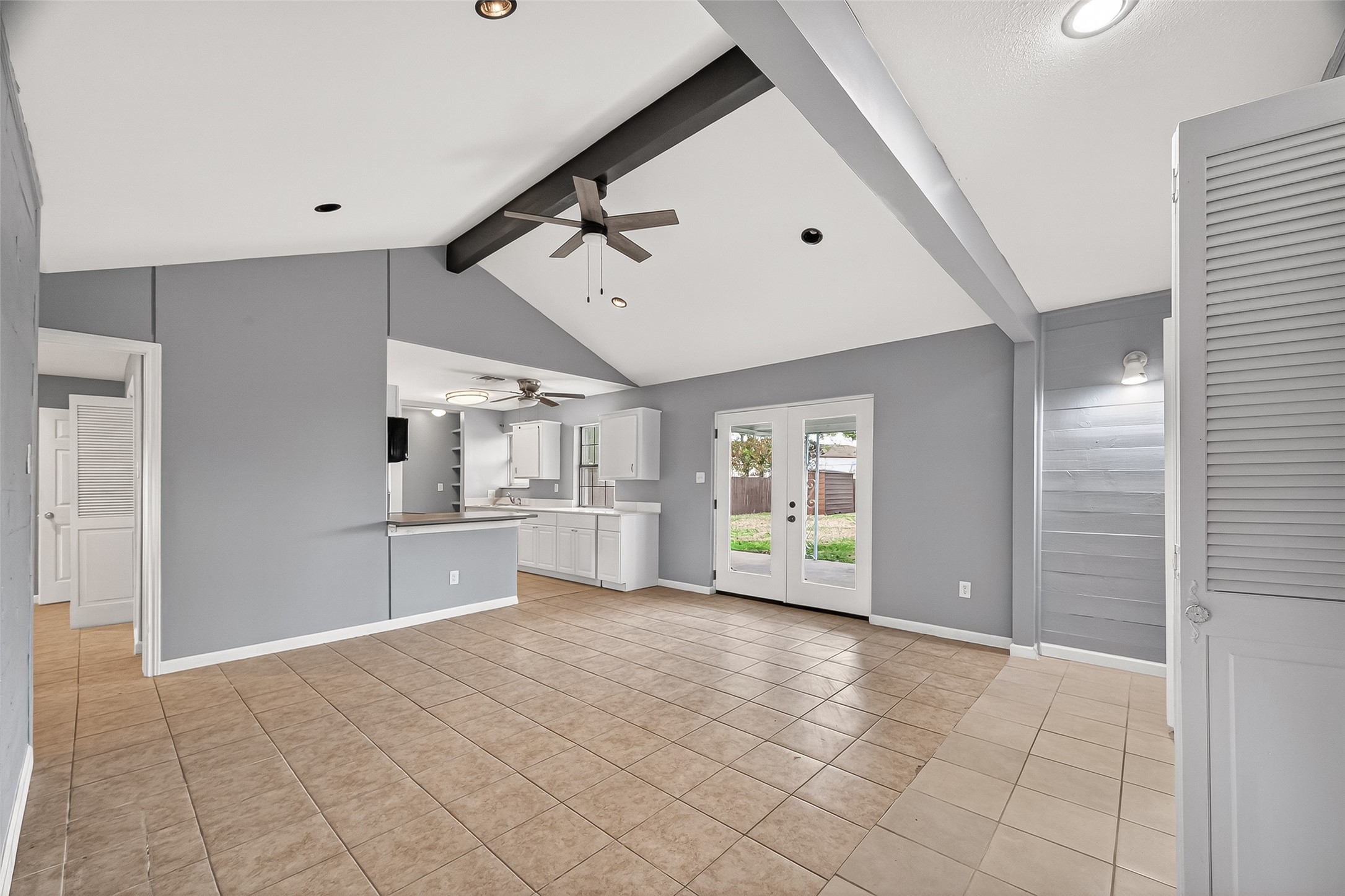 11927 Flushing Meadows Drive Houston, TX 77089 - Photo 6 of 36 a large white room with kitchen area and windows