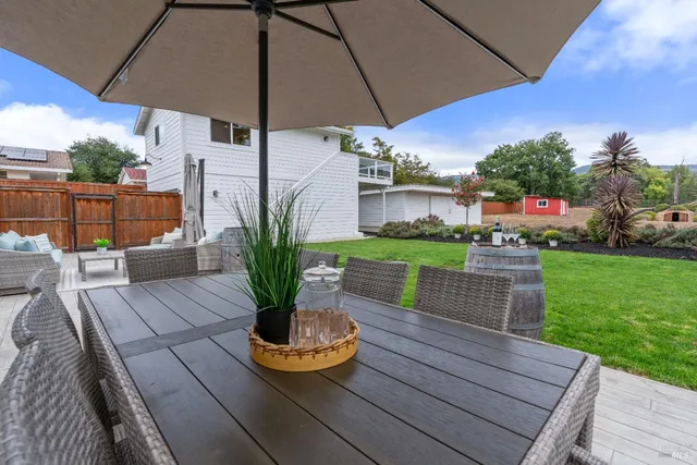 a view of a balcony with chairs