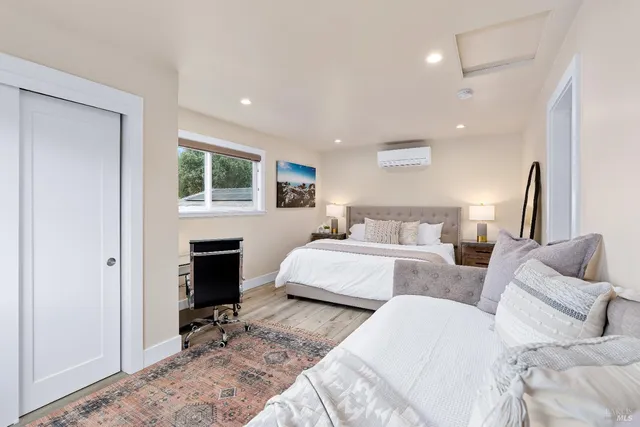 an aerial view of residential houses and outdoor space