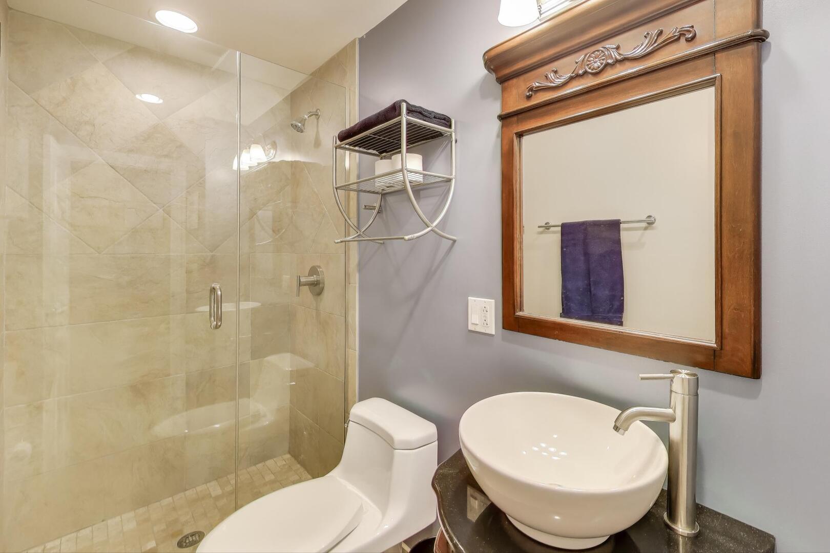 1378 North Wolcott Avenue, Unit 2C Chicago, IL 60622 - Photo 13 of 15 a bathroom with a toilet a sink and shower