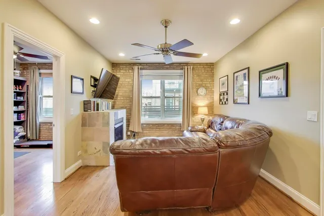 a bed room with furniture and window