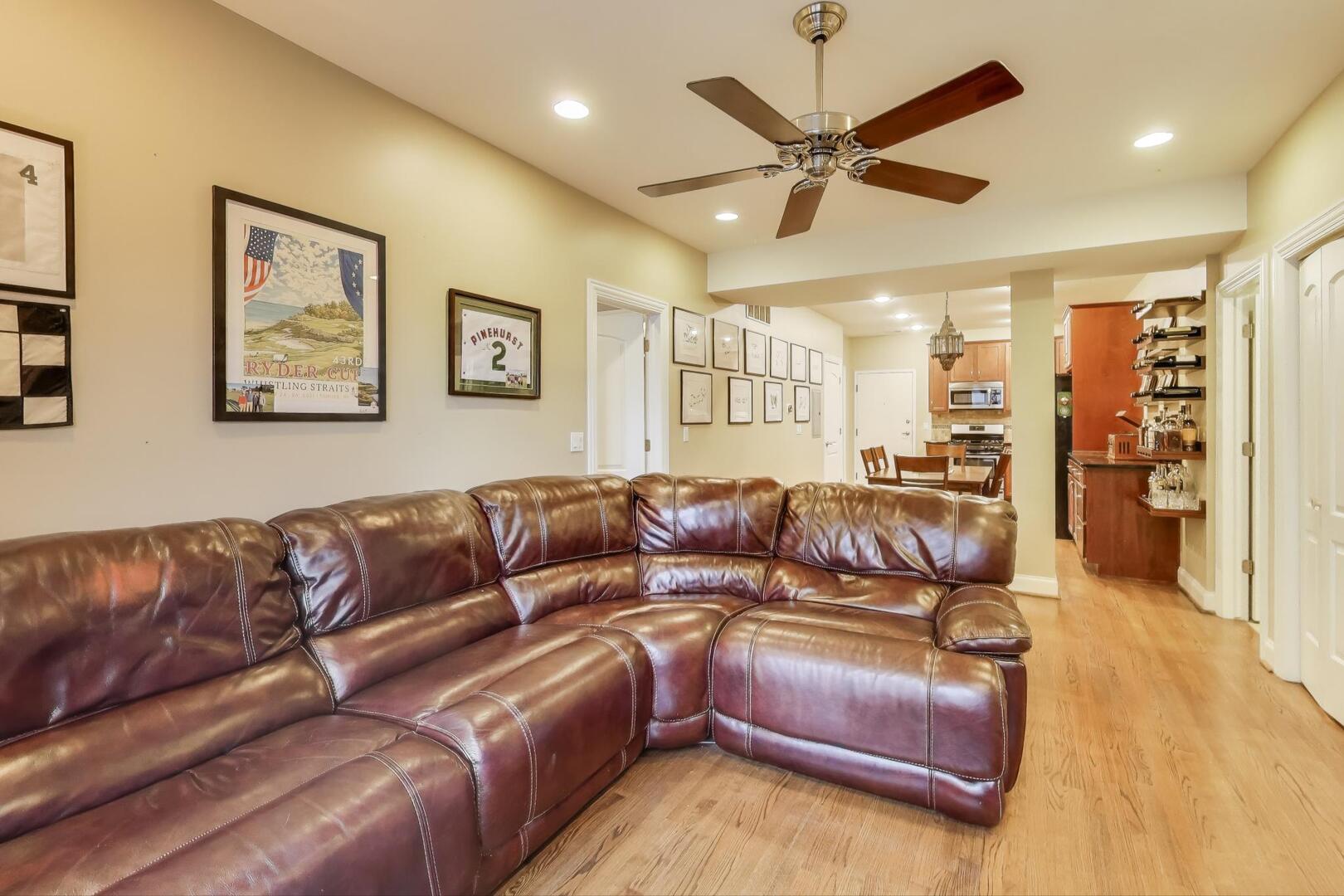 1378 North Wolcott Avenue, Unit 2C Chicago, IL 60622 - Photo 6 of 15 a view of a livingroom with furniture and a ceiling fan