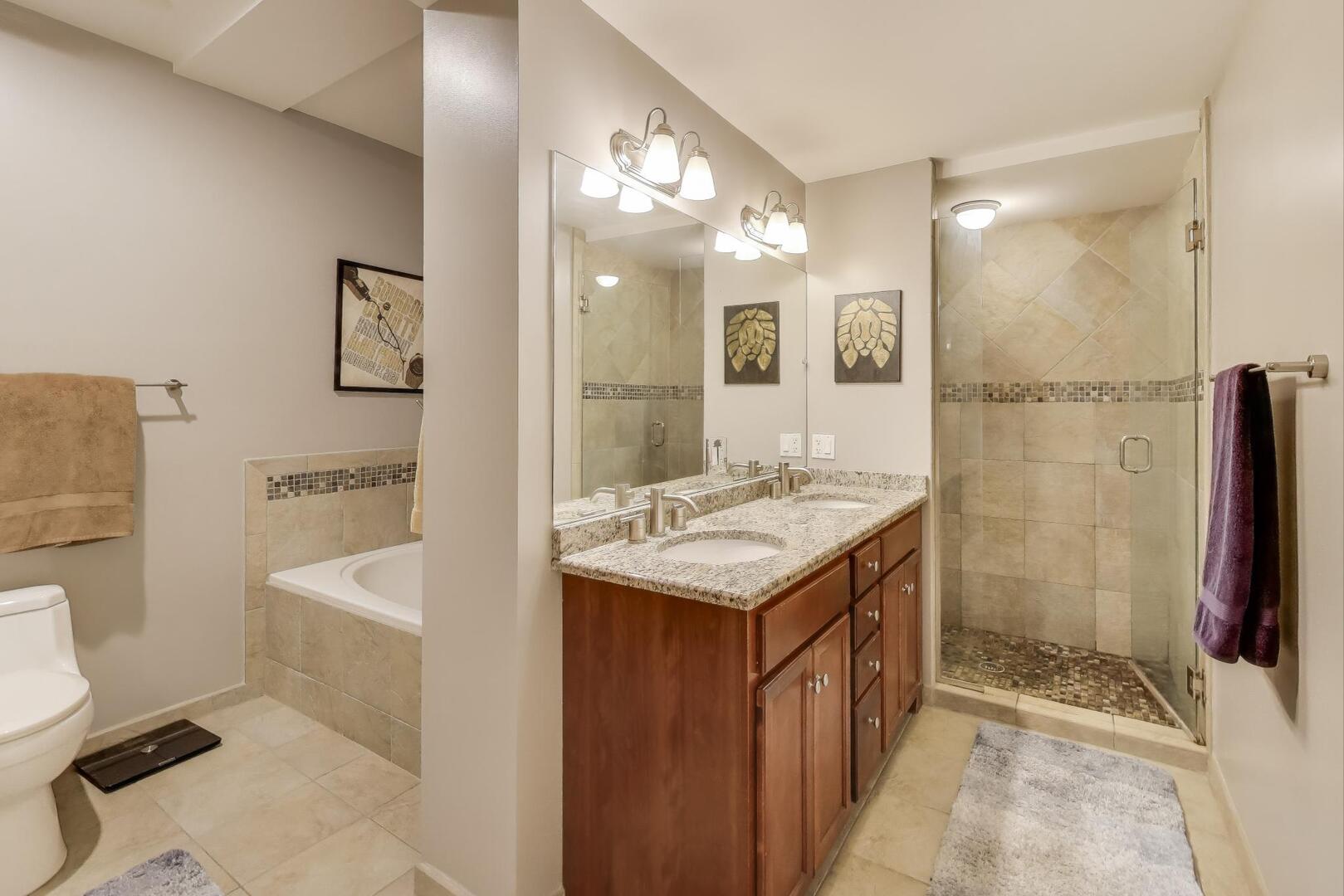 1378 North Wolcott Avenue, Unit 2C Chicago, IL 60622 - Photo 10 of 15 a bathroom with a sink a toilet and a mirror