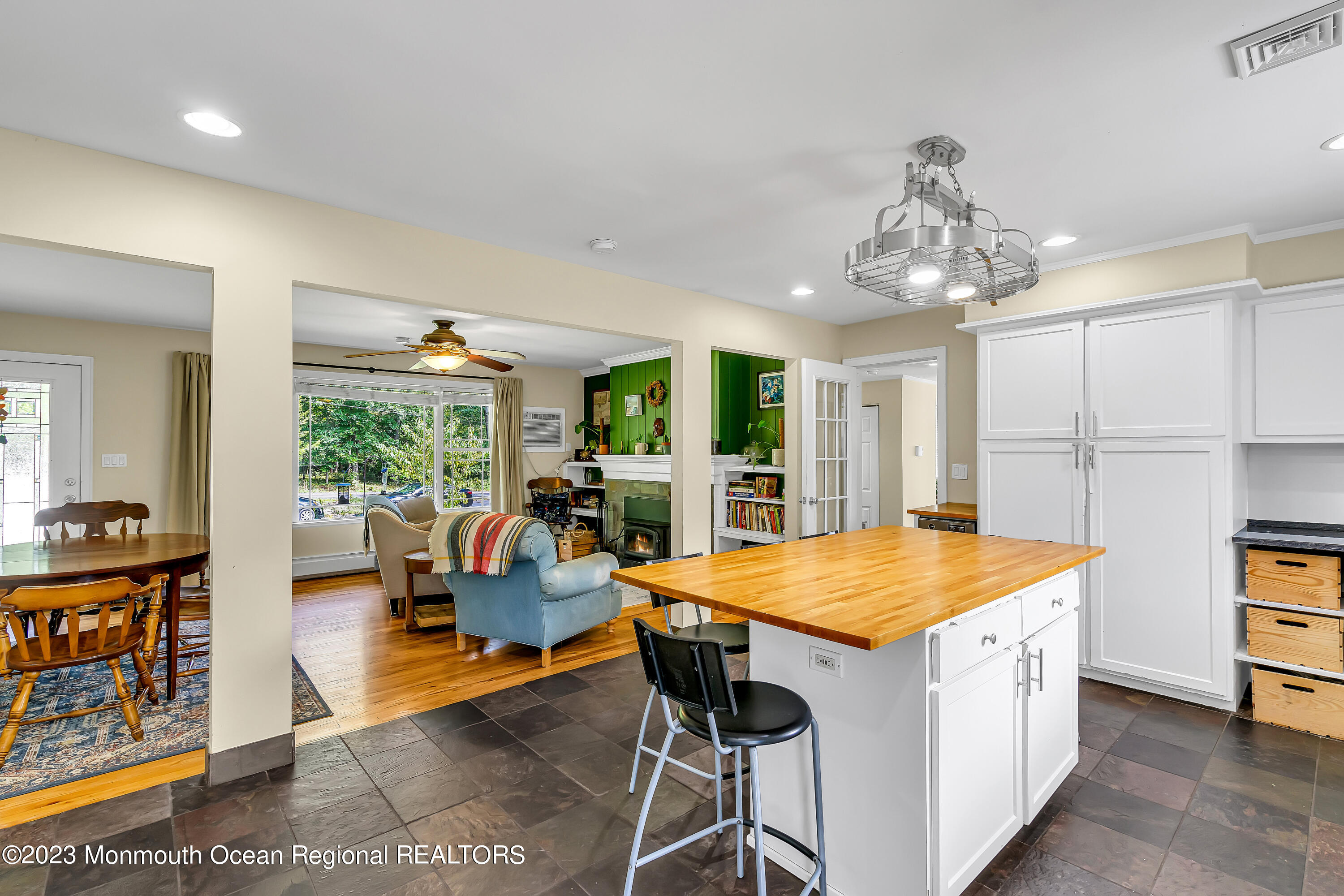 16 Bayberry Road Princeton, NJ 08540 - Photo 13 of 13 a very nice looking dining room with a large dining table and a large window with garden view