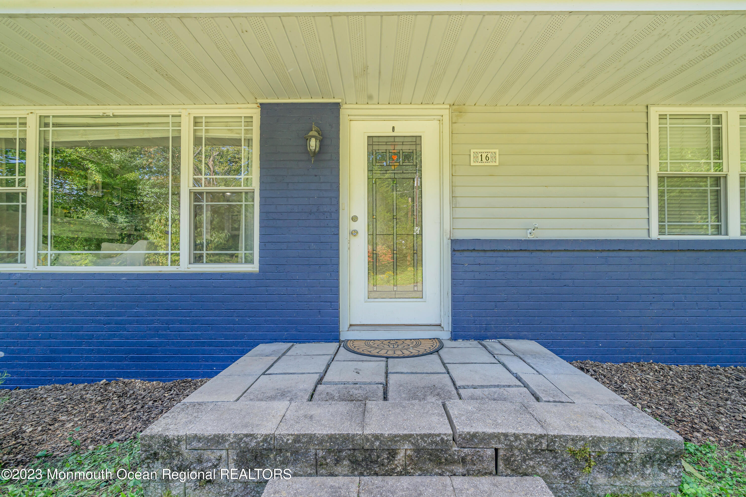 16 Bayberry Road Princeton, NJ 08540 - Photo 4 of 13 a view of a brick house with a yard