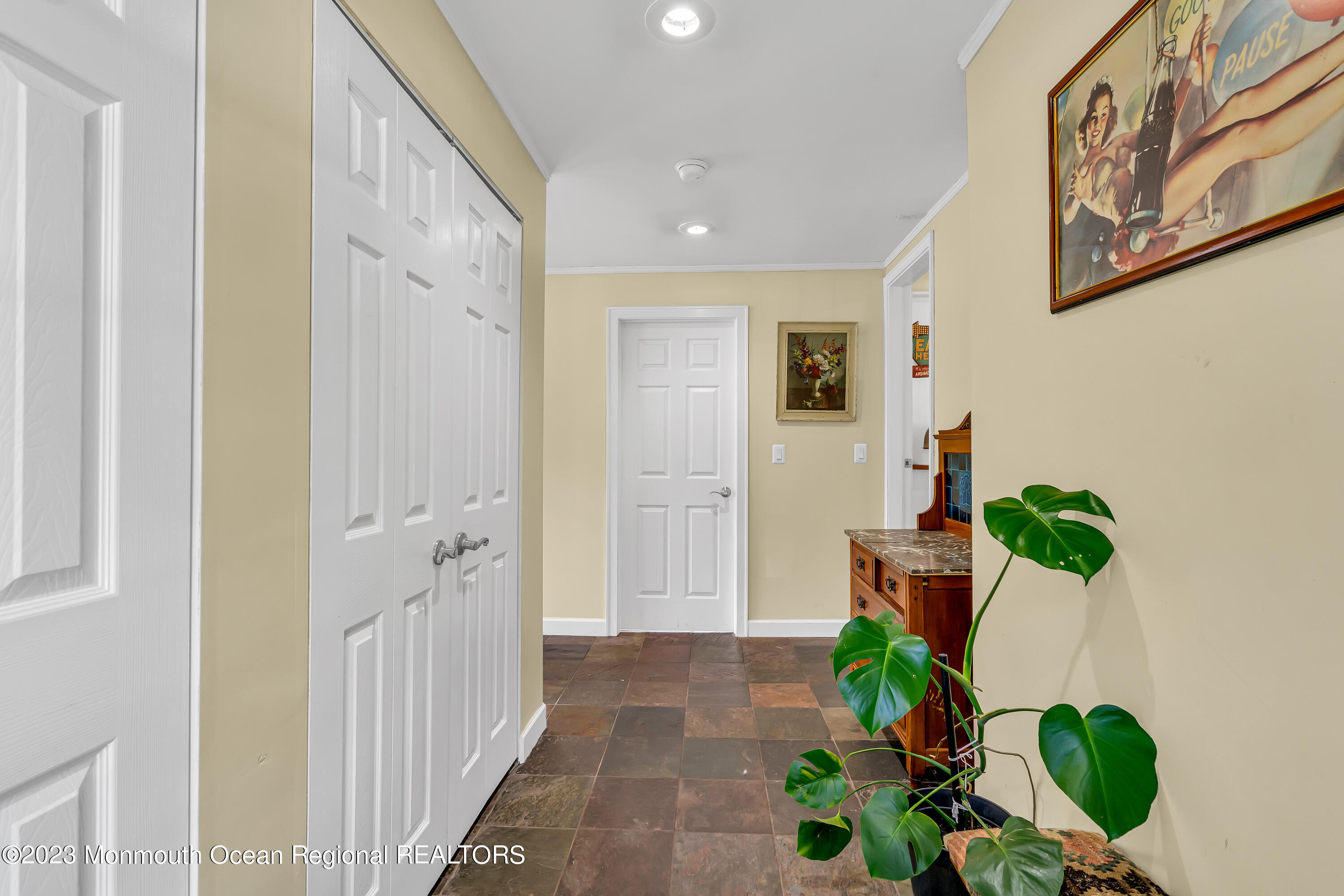 16 Bayberry Road Princeton, NJ 08540 - Photo 6 of 13 a hallway with painting on the wall