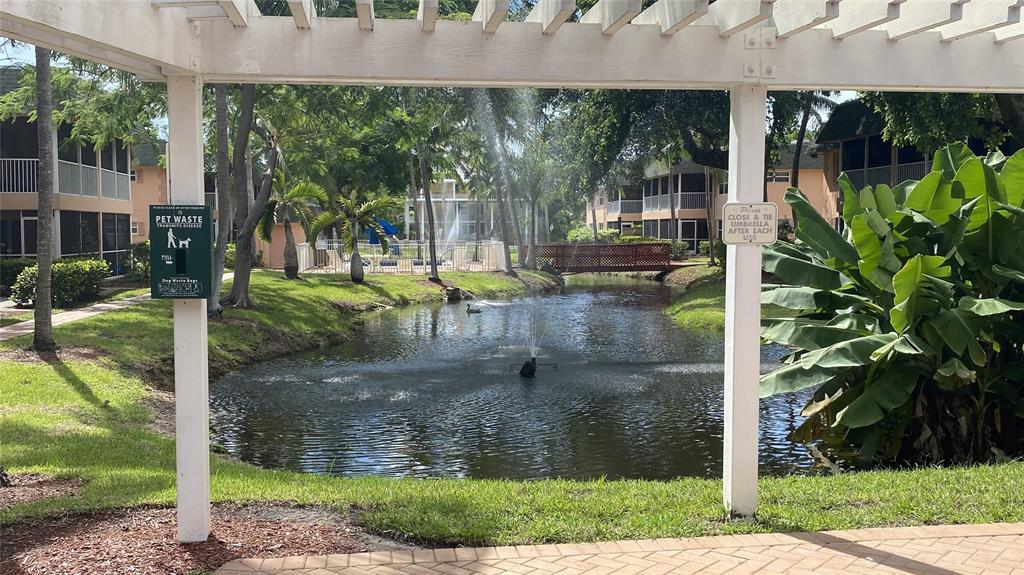 770 Southeast 2nd Avenue, Unit A207 Deerfield Beach, FL 33441 - Photo 20 of 27 a view of a garden