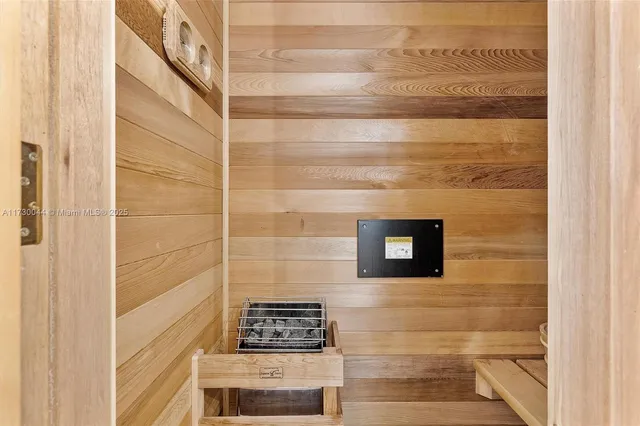 a bedroom with bed and a window