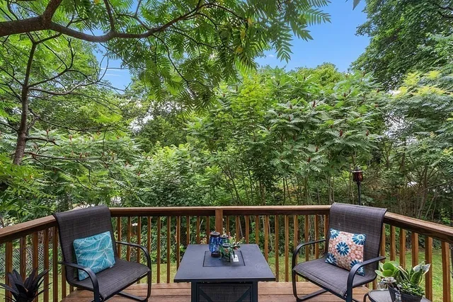 a view of a two chairs in the deck