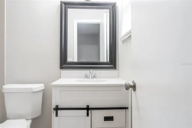 a bathroom with a sink and a toilet