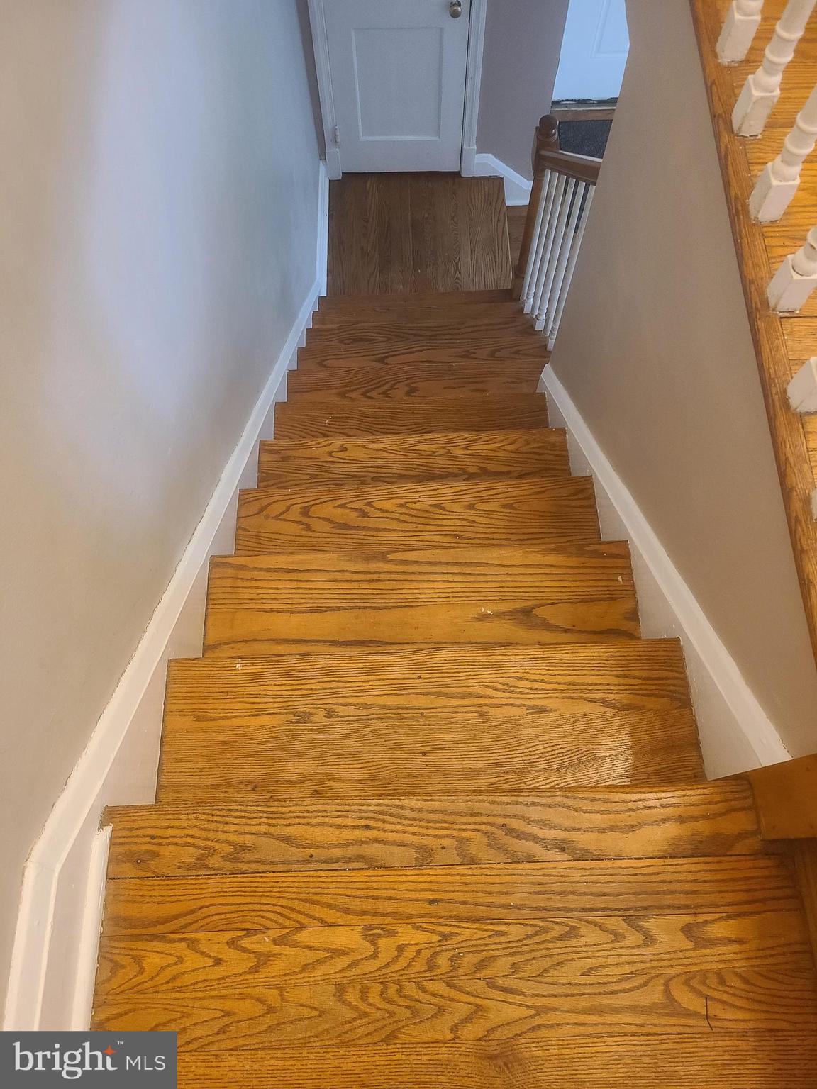 1627 Aberdeen Road Towson, MD 21286 - Photo 28 of 65 Hardwood stairs to upper level
