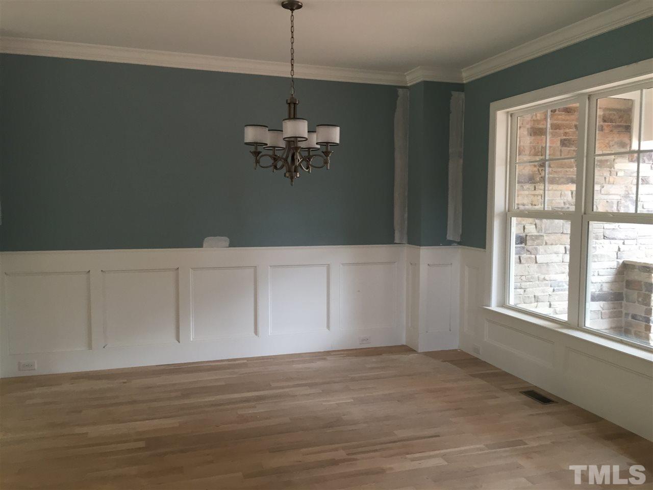 2016 Bowling Green Trail Raleigh, NC 27613 - Photo 4 of 20 a view of an empty room with a window