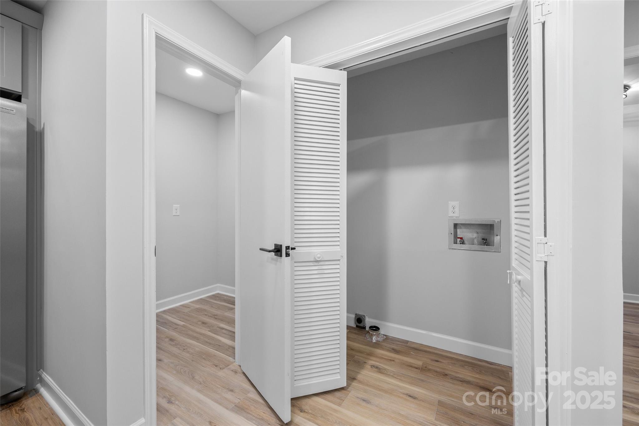 7301 Timber Ridge Drive Mint Hill, NC 28227 - Photo 12 of 37 a view of a hallway with closet and stairs