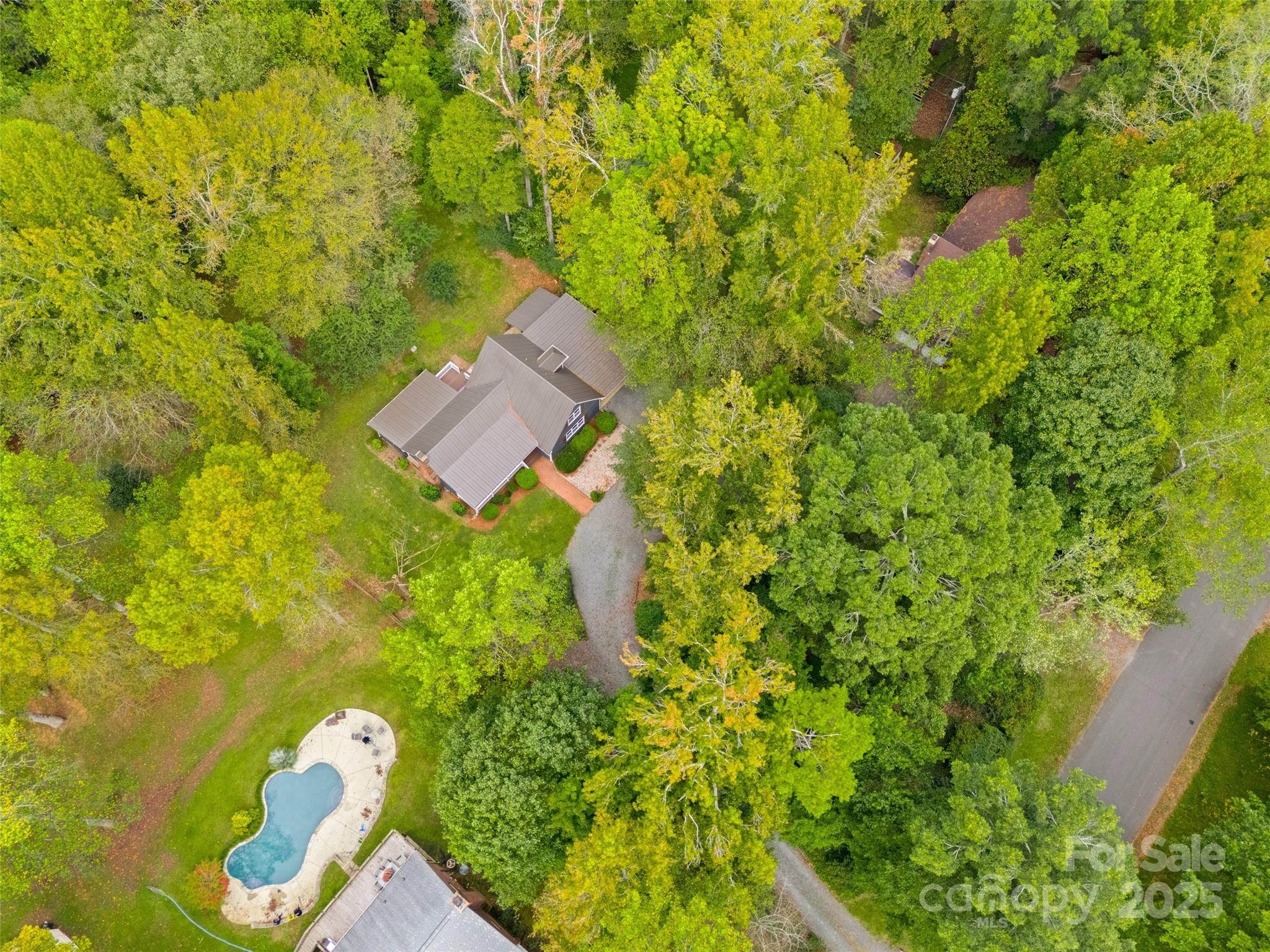 7301 Timber Ridge Drive Mint Hill, NC 28227 - Photo 35 of 37 a view of a house with a tree