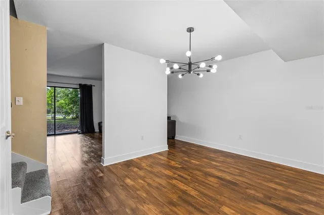 a view of livingroom with hardwood floor and window