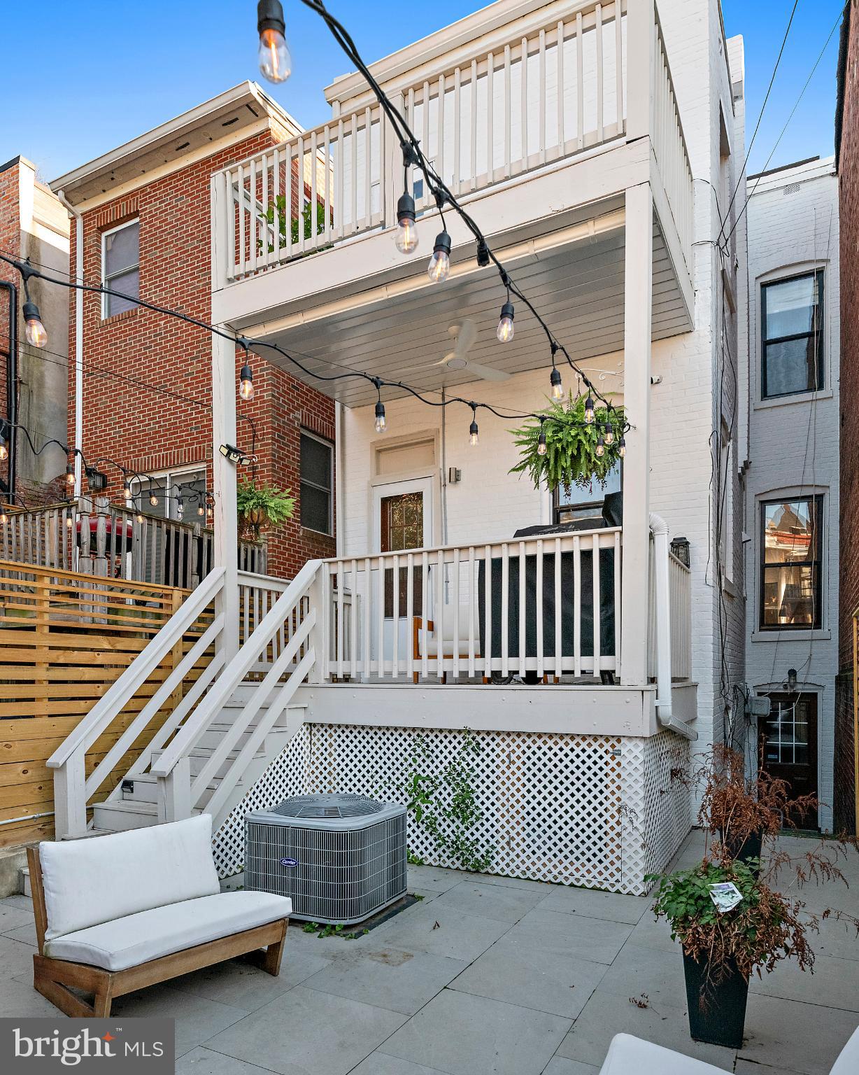 55 S Street Northwest Washington, DC 20001 - Photo 23 of 25 a balcony with furniture and a potted plant