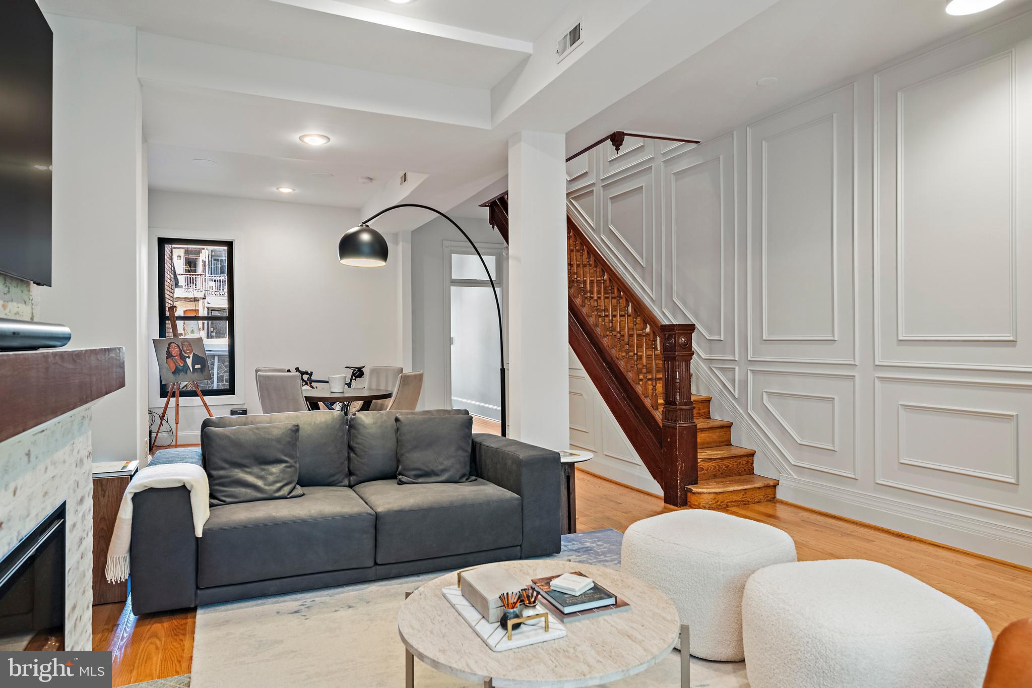 55 S Street Northwest Washington, DC 20001 - Photo 5 of 25 a living room with furniture and a painting