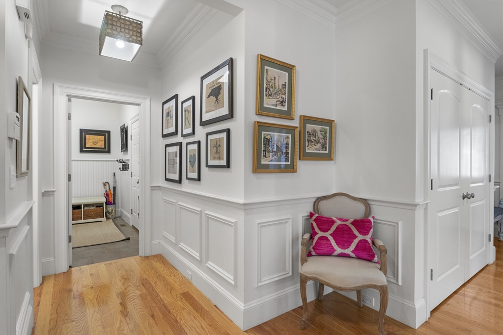 38 Longacre Road Needham, MA 02492 - Photo 12 of 42 a living room with furniture and paintings on the wall