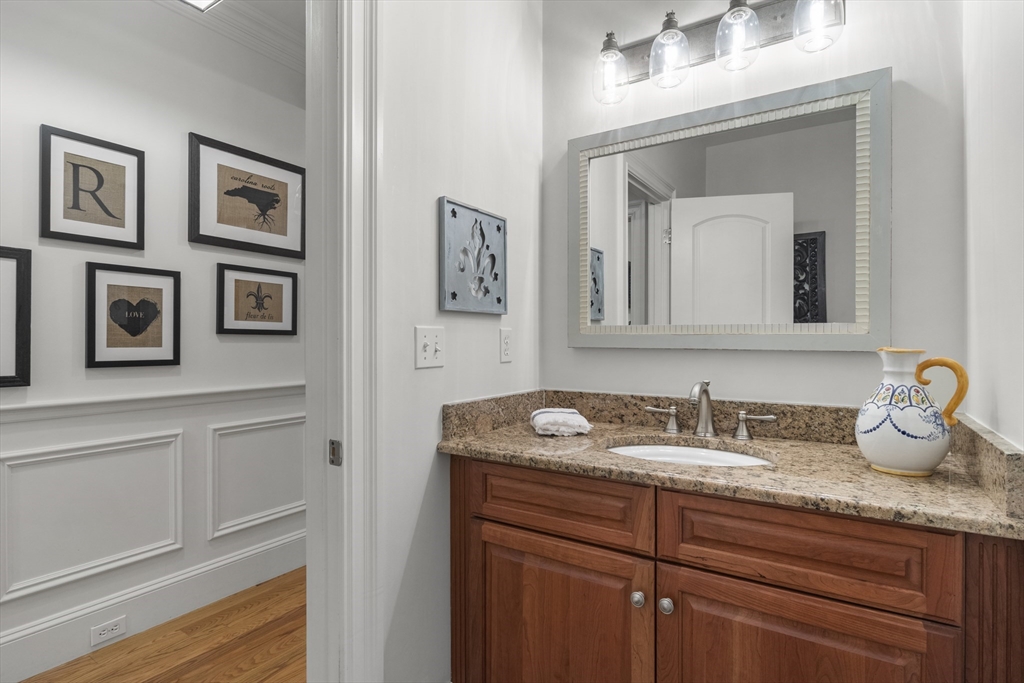 38 Longacre Road Needham, MA 02492 - Photo 14 of 42 a bathroom with a sink vanity and mirror