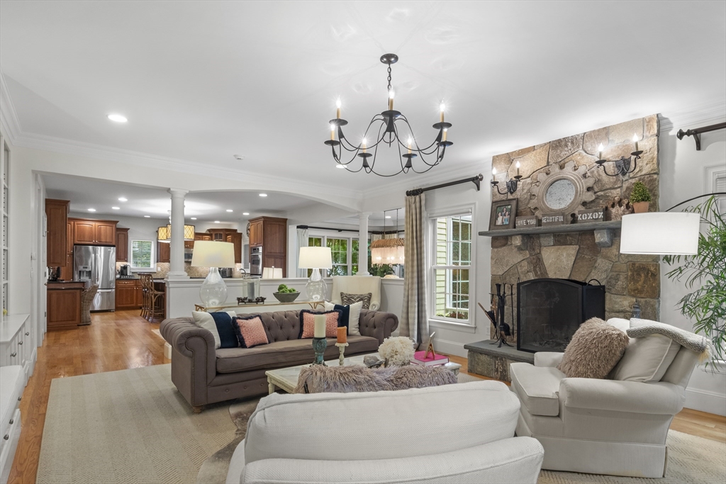 38 Longacre Road Needham, MA 02492 - Photo 18 of 42 a living room with furniture and a fireplace