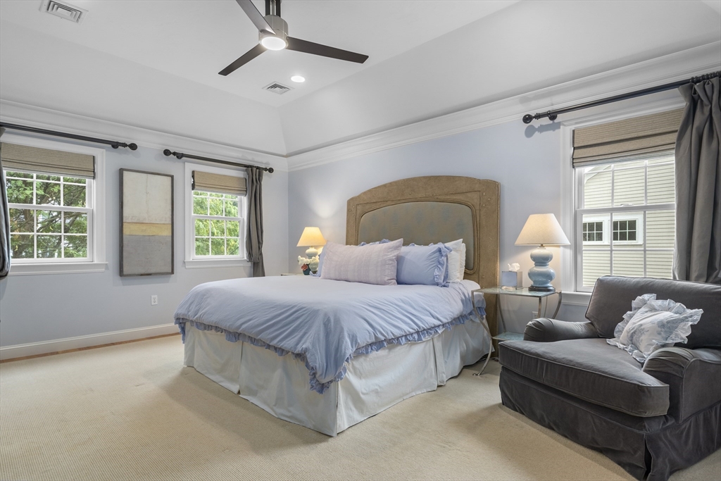 38 Longacre Road Needham, MA 02492 - Photo 27 of 42 a spacious bedroom with a bed couch and window