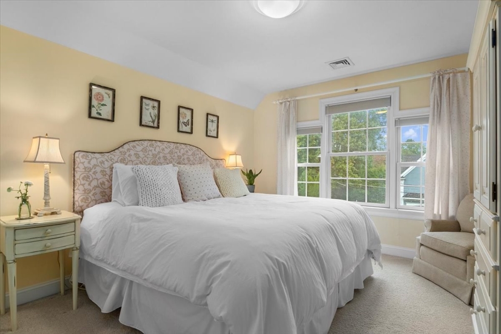 38 Longacre Road Needham, MA 02492 - Photo 29 of 42 a bedroom with a bed and a couch