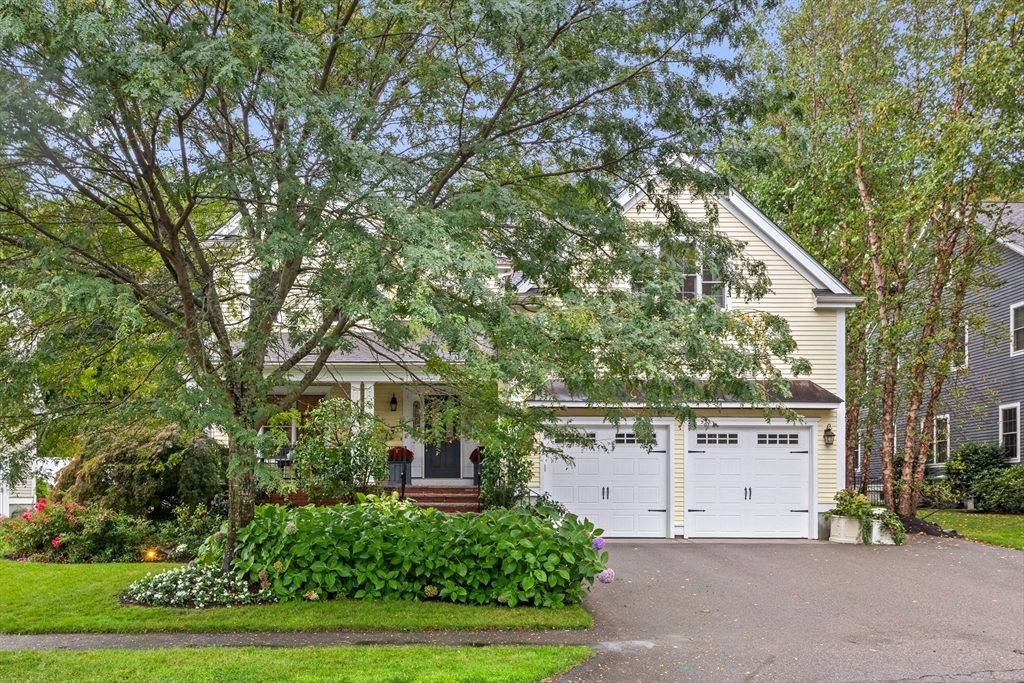 38 Longacre Road Needham, MA 02492 - Photo 3 of 42 a front view of a house with a yard