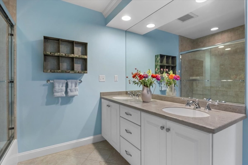 38 Longacre Road Needham, MA 02492 - Photo 34 of 42 a bathroom with a sink and a mirror