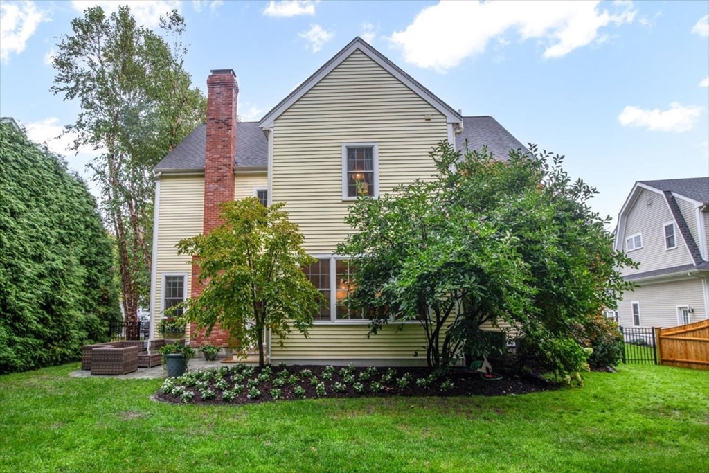38 Longacre Road Needham, MA 02492 - Photo 38 of 42 a view of a house with a yard