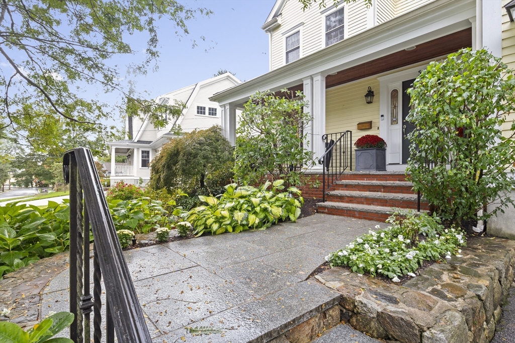 38 Longacre Road Needham, MA 02492 - Photo 4 of 42 a front view of a house with garden