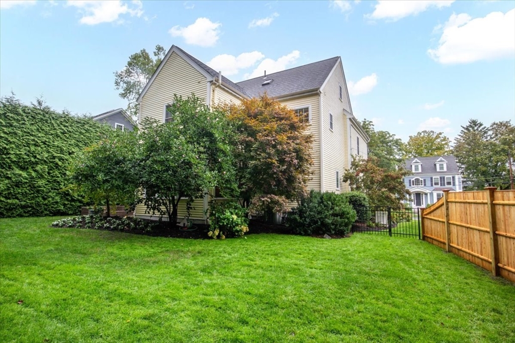 38 Longacre Road Needham, MA 02492 - Photo 41 of 42 a view of a house with backyard and garden