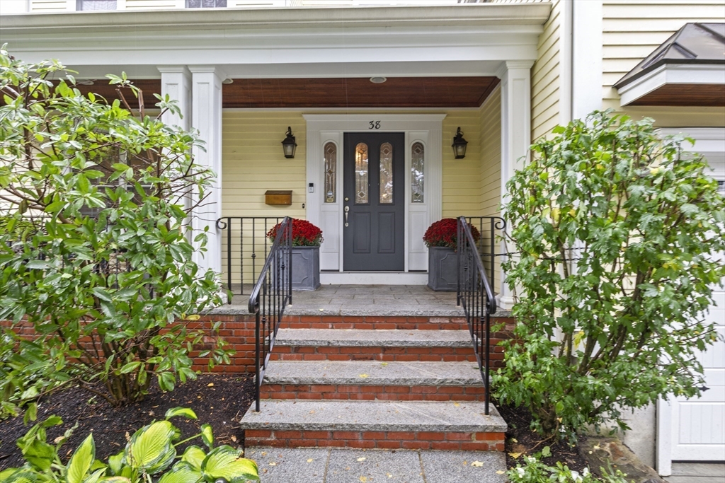 38 Longacre Road Needham, MA 02492 - Photo 5 of 42 a front view of a house with plants