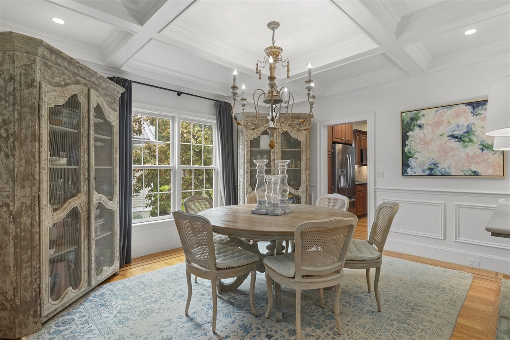 38 Longacre Road Needham, MA 02492 - Photo 10 of 42 a dining room with furniture a chandelier and window