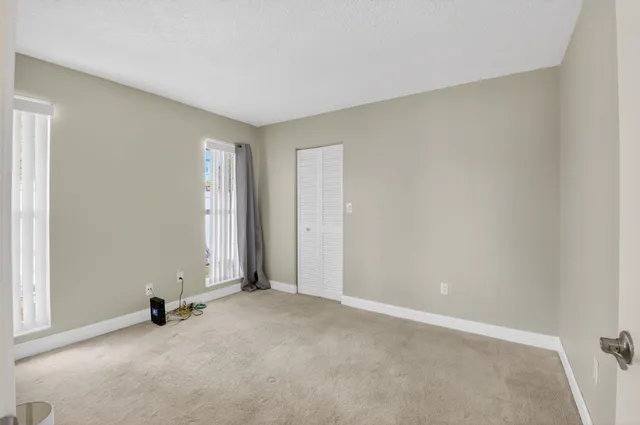 a view of a room with a large window