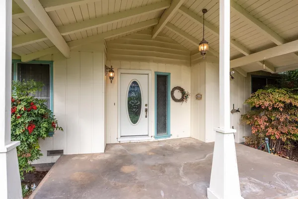 a view of a entryway door front of house