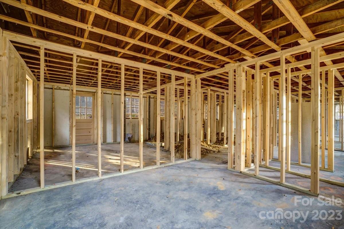 402 South Starr Street Dallas, NC 28034 - Photo 18 of 25 a view of an empty room with wooden walls