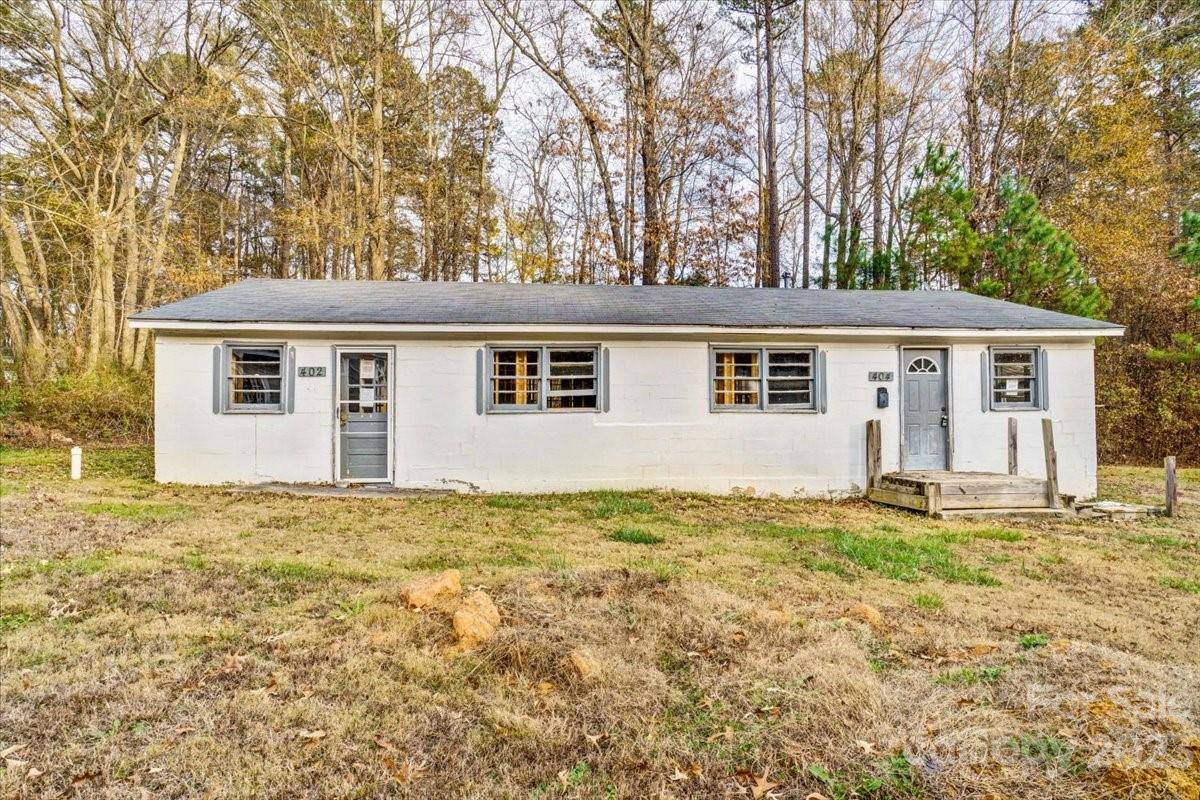 402 South Starr Street Dallas, NC 28034 - Photo 3 of 25 front view of a house with a yard