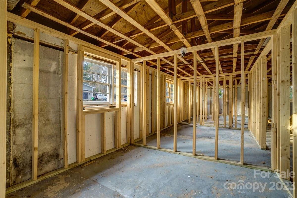 402 South Starr Street Dallas, NC 28034 - Photo 9 of 25 a view of an empty room with wooden walls
