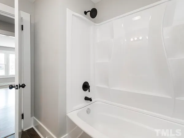 a bathroom with a bathtub