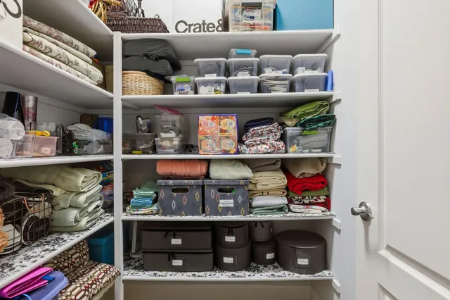 a view of a house with a tree