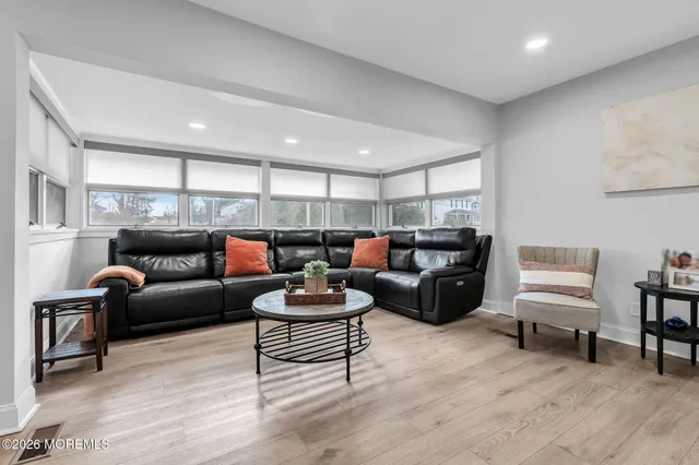 a living room with furniture and a couch