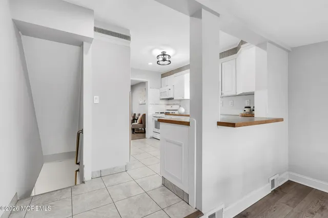 a bed room with a bed and a television