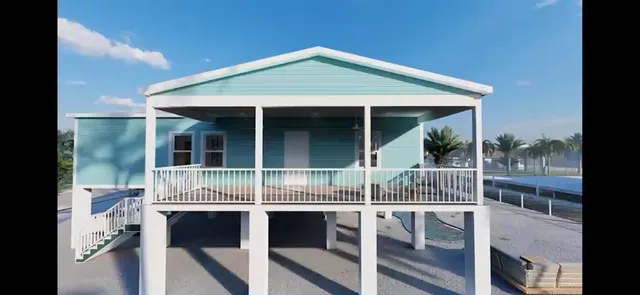 a house view with a sitting space and balcony