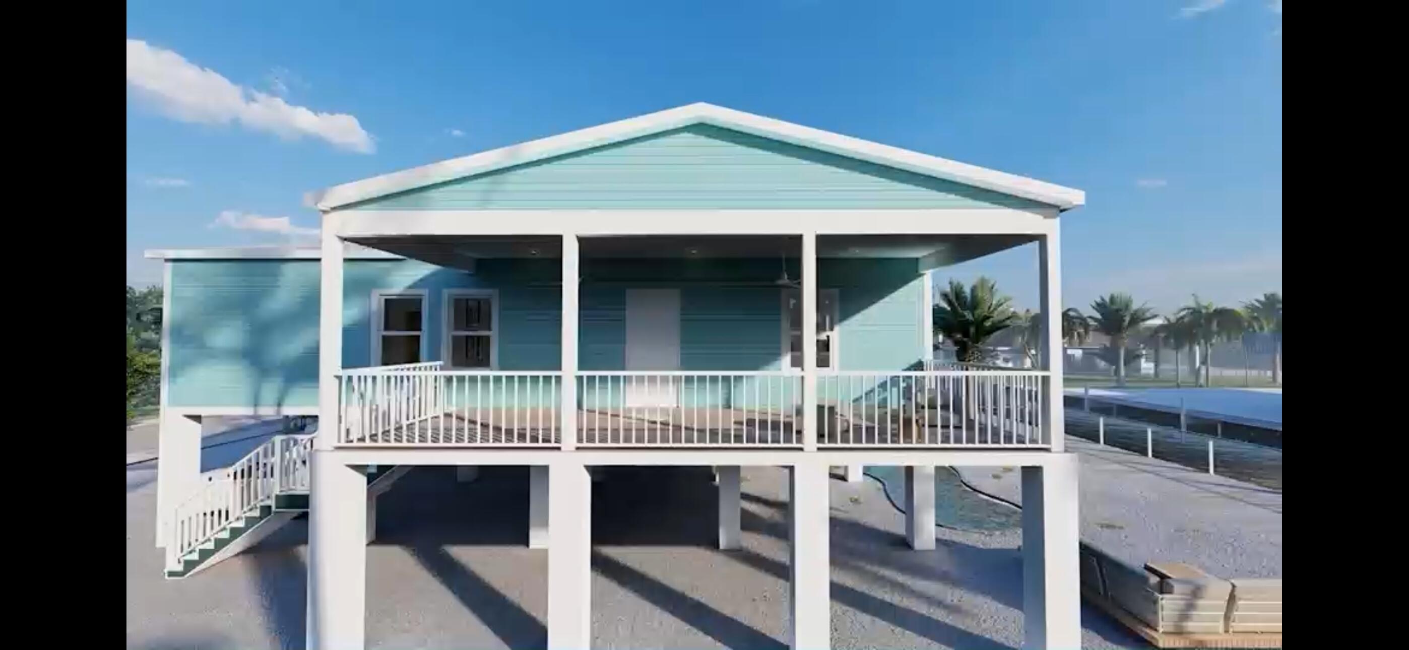 Undisclosed Address Summerland Key, FL 33042 - Photo 5 of 6 a house view with a sitting space and balcony