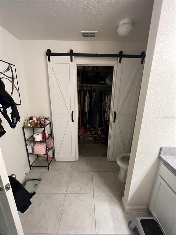 2489 Bulrush Drive St. Cloud, FL 34769 - Photo 12 of 22 a view of an entryway with a furniture