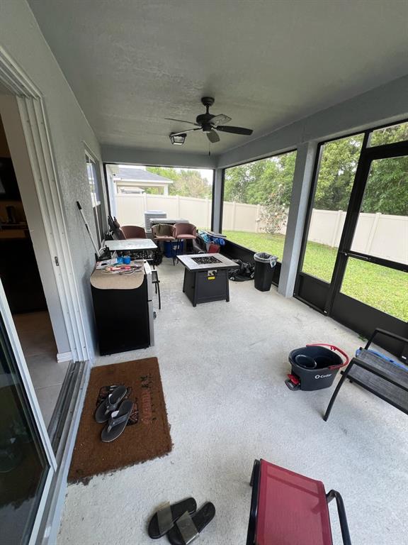 2489 Bulrush Drive St. Cloud, FL 34769 - Photo 19 of 22 a room with furniture and a large window